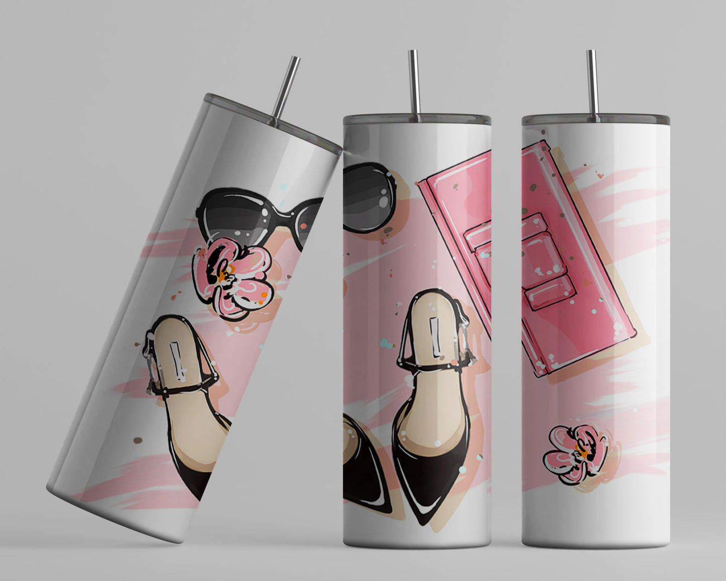 This is a white  20oz tumbler with a pink brush stroke background, on top of the background  we have a pair of black ladies dress shoes, sunglasses and pink clutch with two pink flowers . The tumbler has a stainless straw.